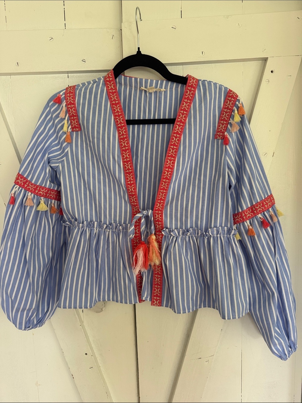 Rebellion Blue and White Striped Tassel-Trim Peplum Blouse